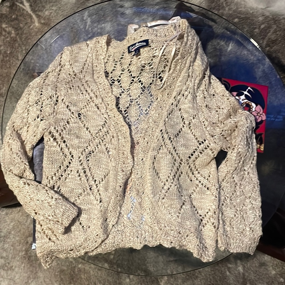 Cute beige colored sweater/cardigan
